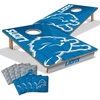 image:imageYouTheFan NFL 2 x 3 Wood Cornhole Game with Logo BagsTeam Colors