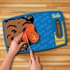 image:imageYouTheFan NCAA Officiallylicensed Logo Series Cutting Board  reversible design for double the cutting surface  gentle on knives team message on both front and backUCLA Bruins